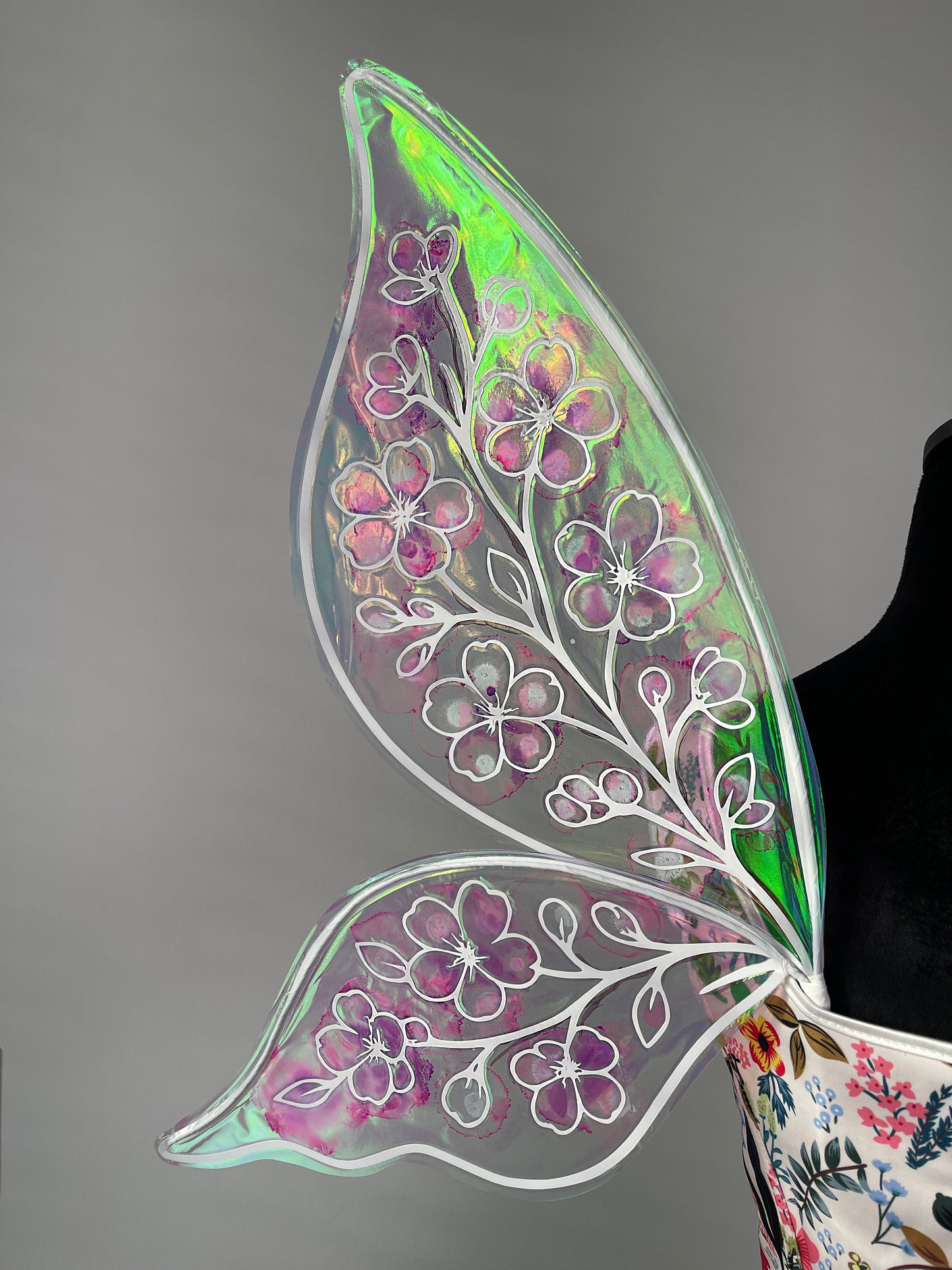 Close up detail of floral fairy wings artwork