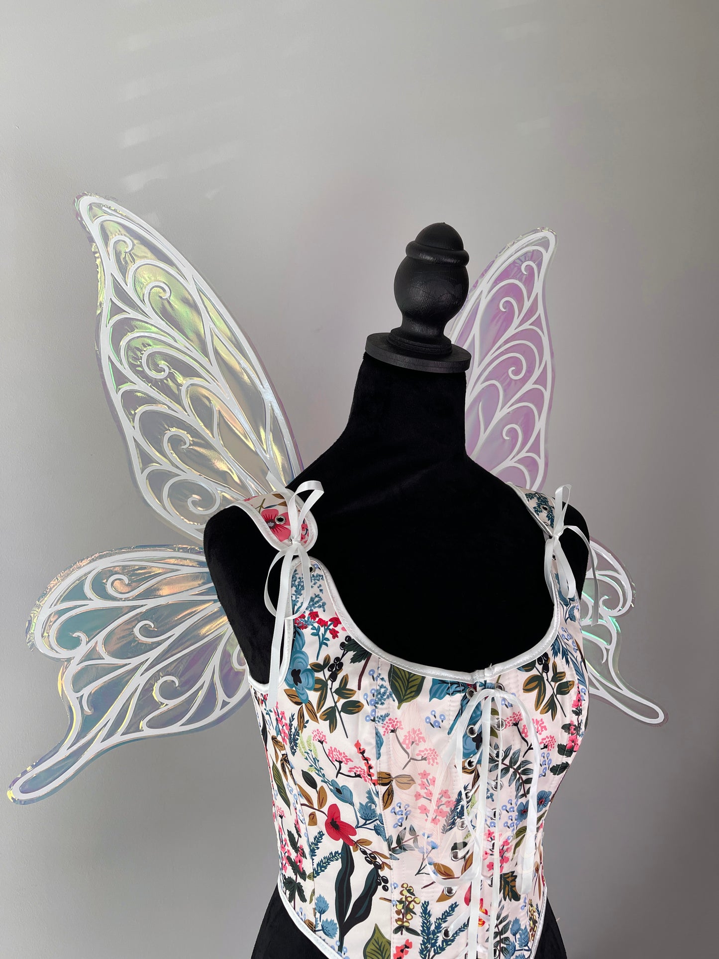 Elf inspired iridescent fairy wings shimmering in light