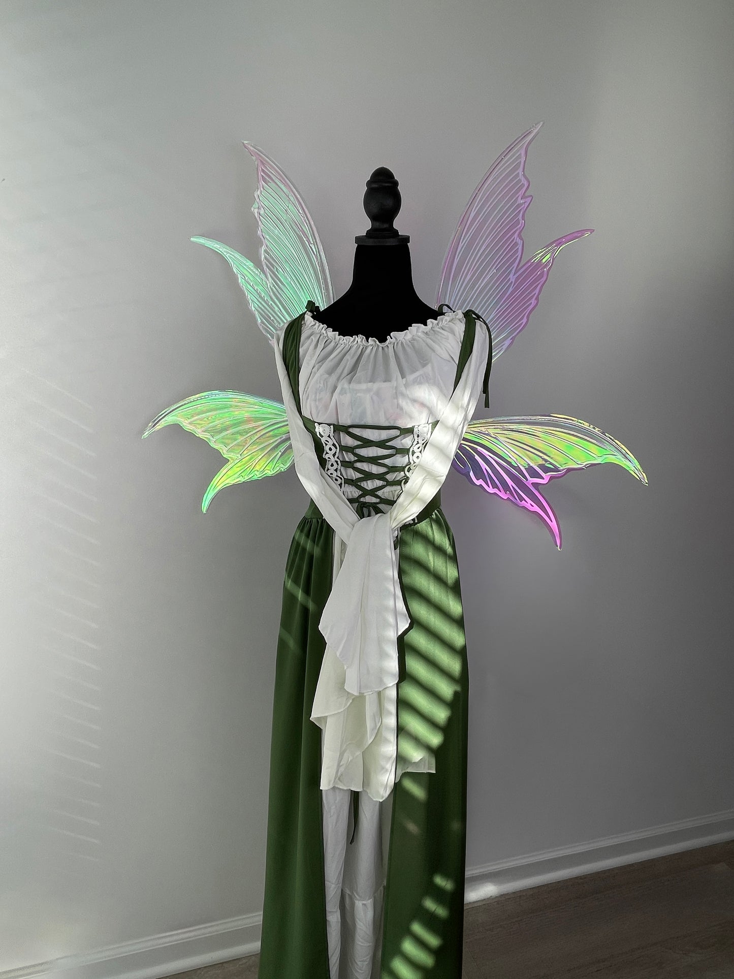 Iridescent fantasy wings under sun lighting