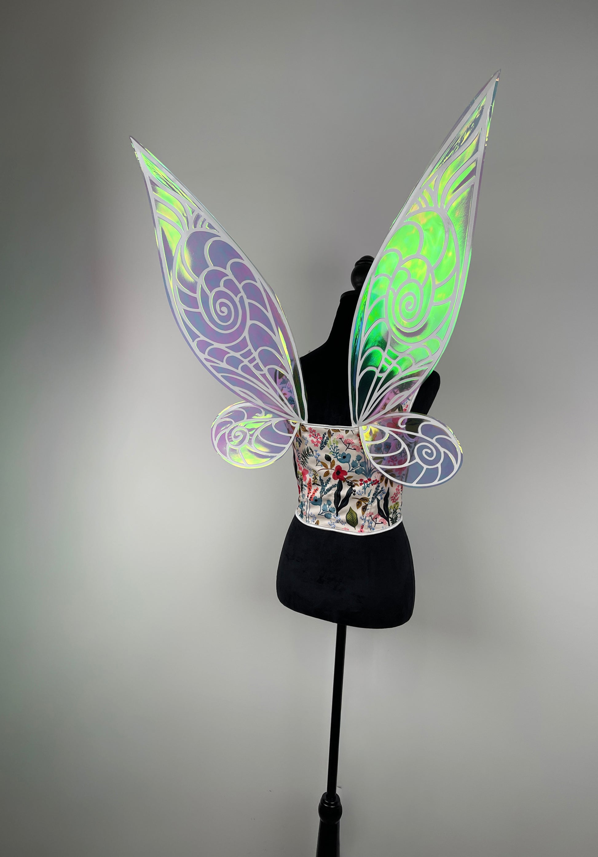 Fairy fantasy costume wings on a mannequin against a gray background