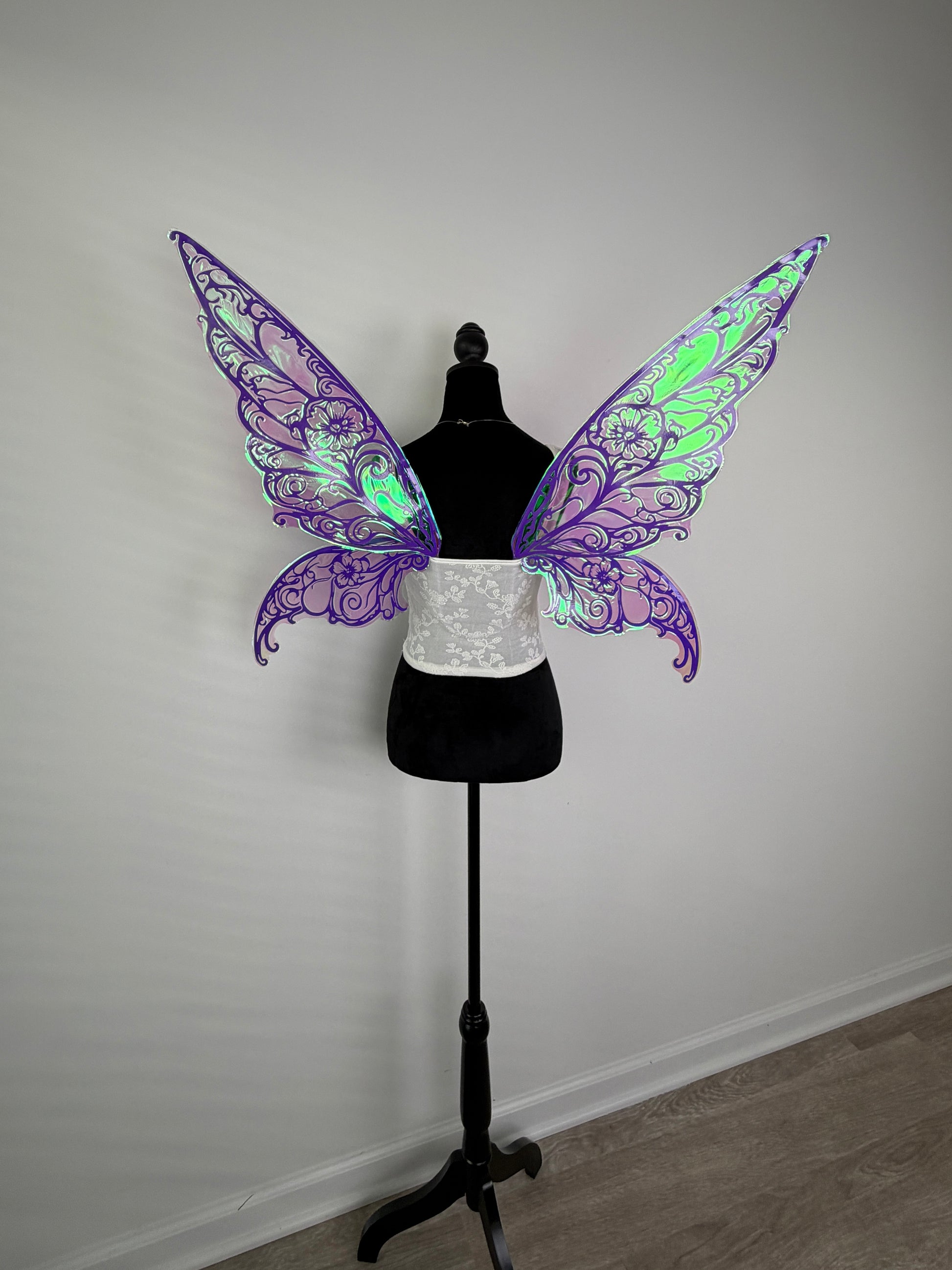 Purple iridescent fairy wings reflecting light