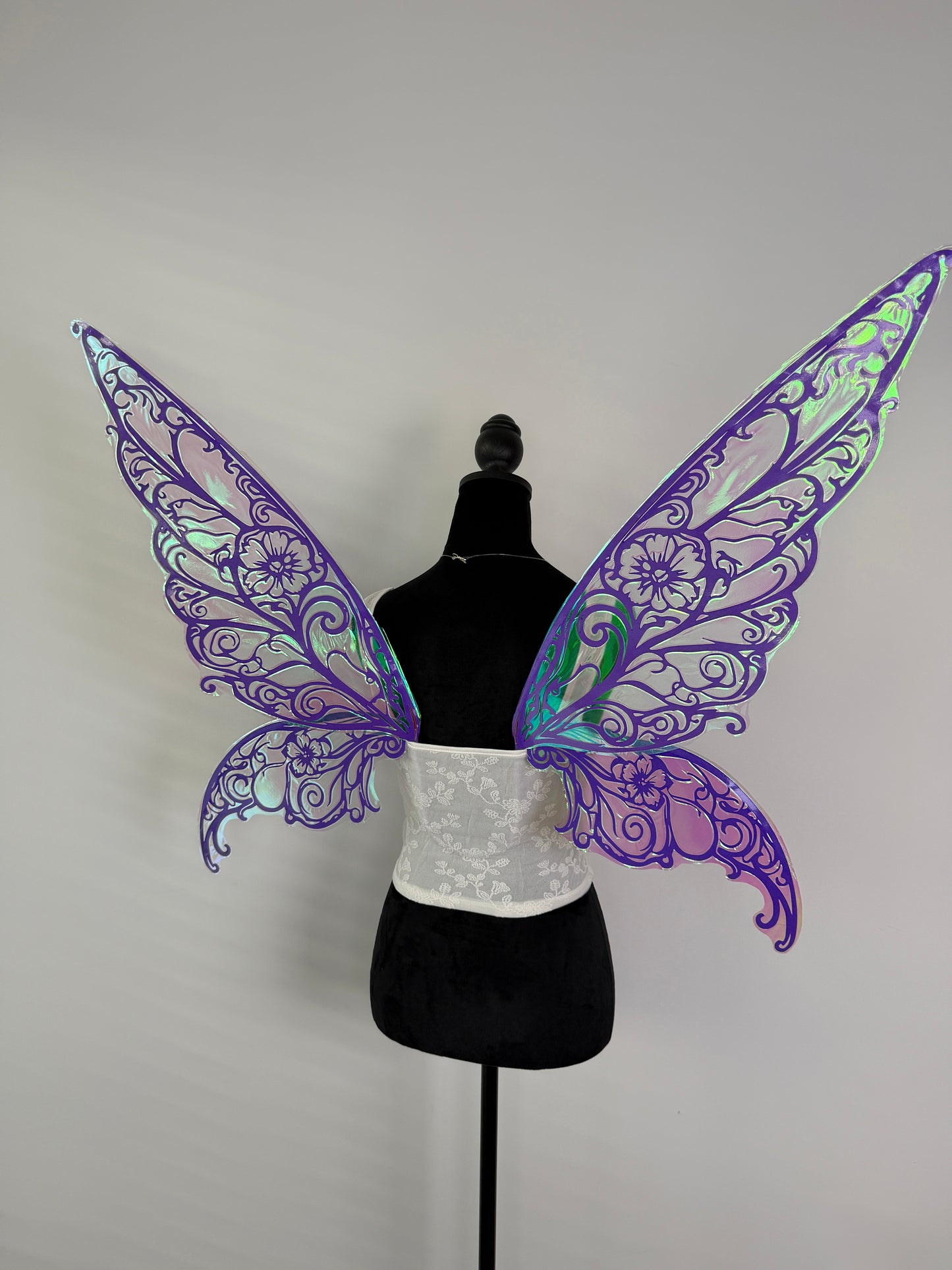 Back view of purple fairy wings costume