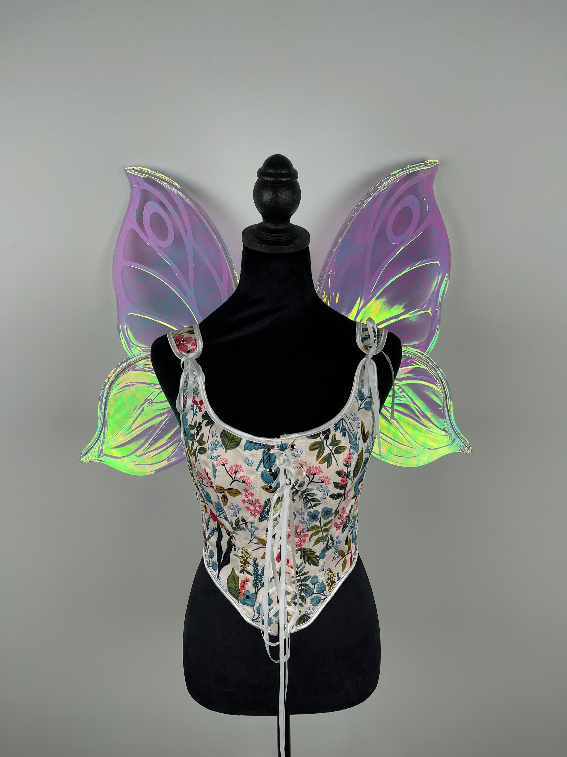 Detailed white butterfly vein design on handmade iridescent fairy wings