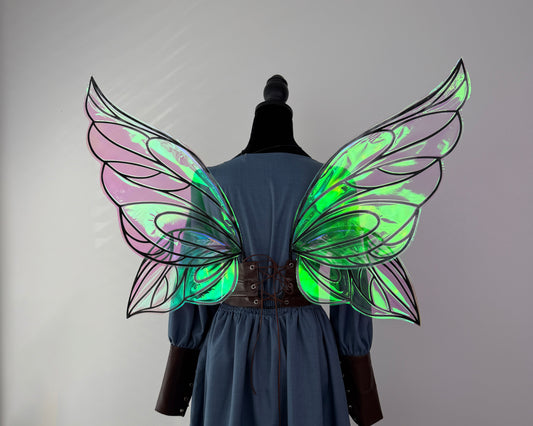 Dark fae costume wings with pointed tips, dramatic outlines and a magical reflective finish