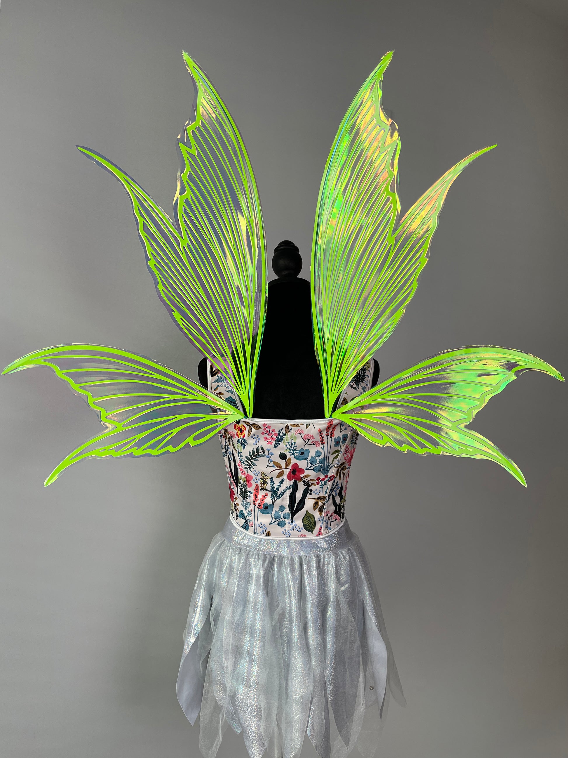 Glowing neon green fairy wings with butterfly shape reflective material for cosplay festival and fantasy costume