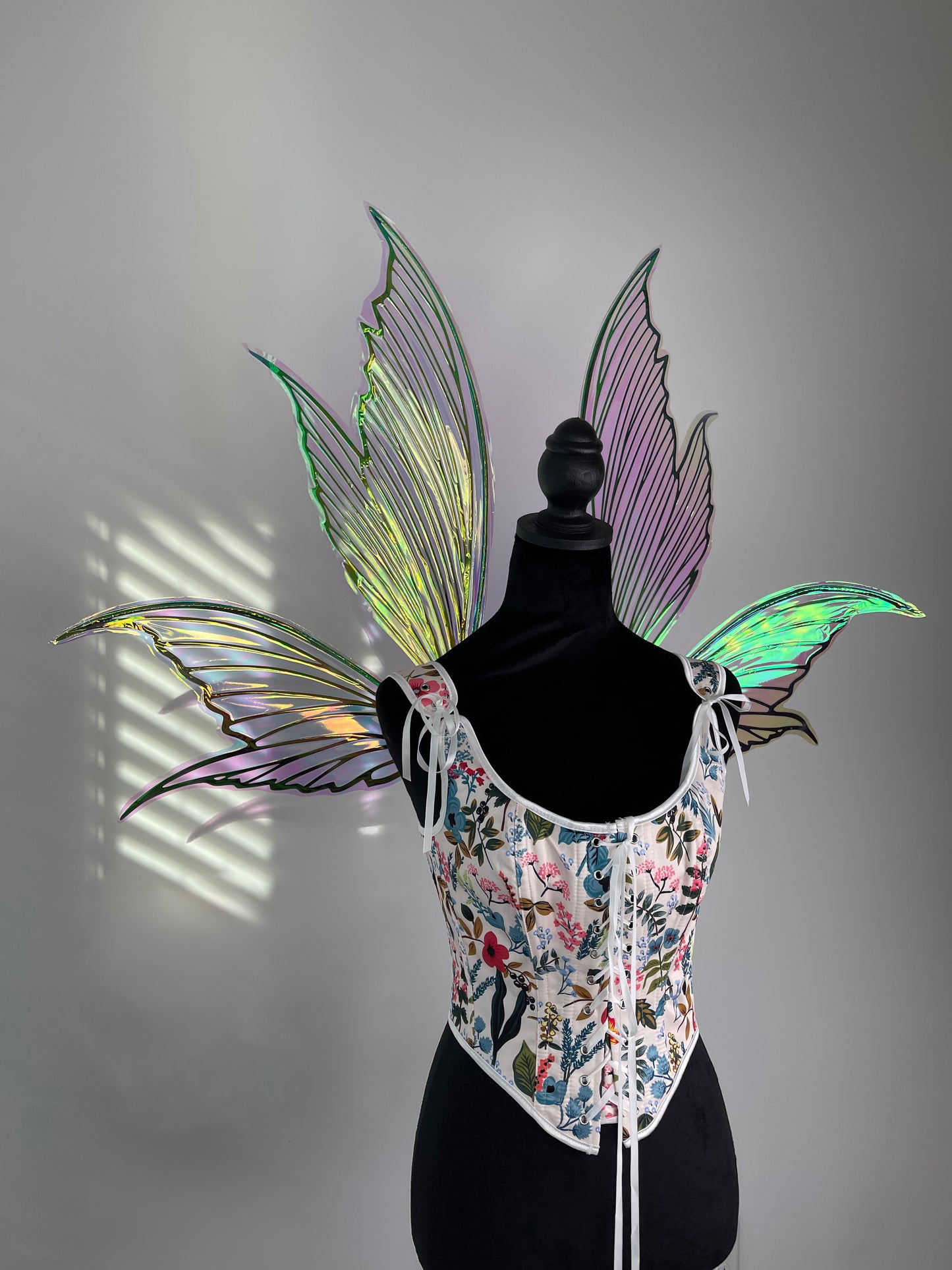 Iridescent butterfly fairy wings with shimmering reflective material for cosplay costume