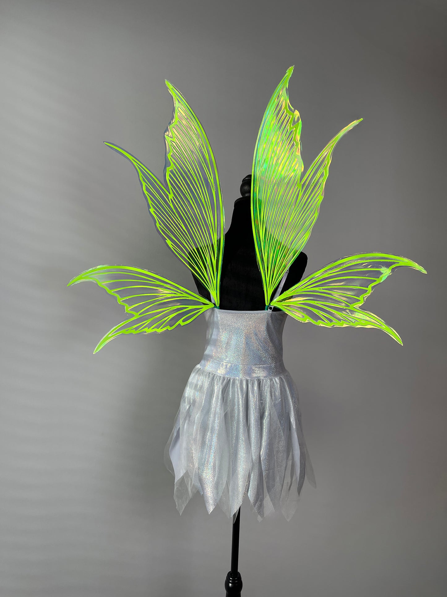 Iridescent neon green butterfly fairy wings with holographic shine for festival cosplay and fantasy costume