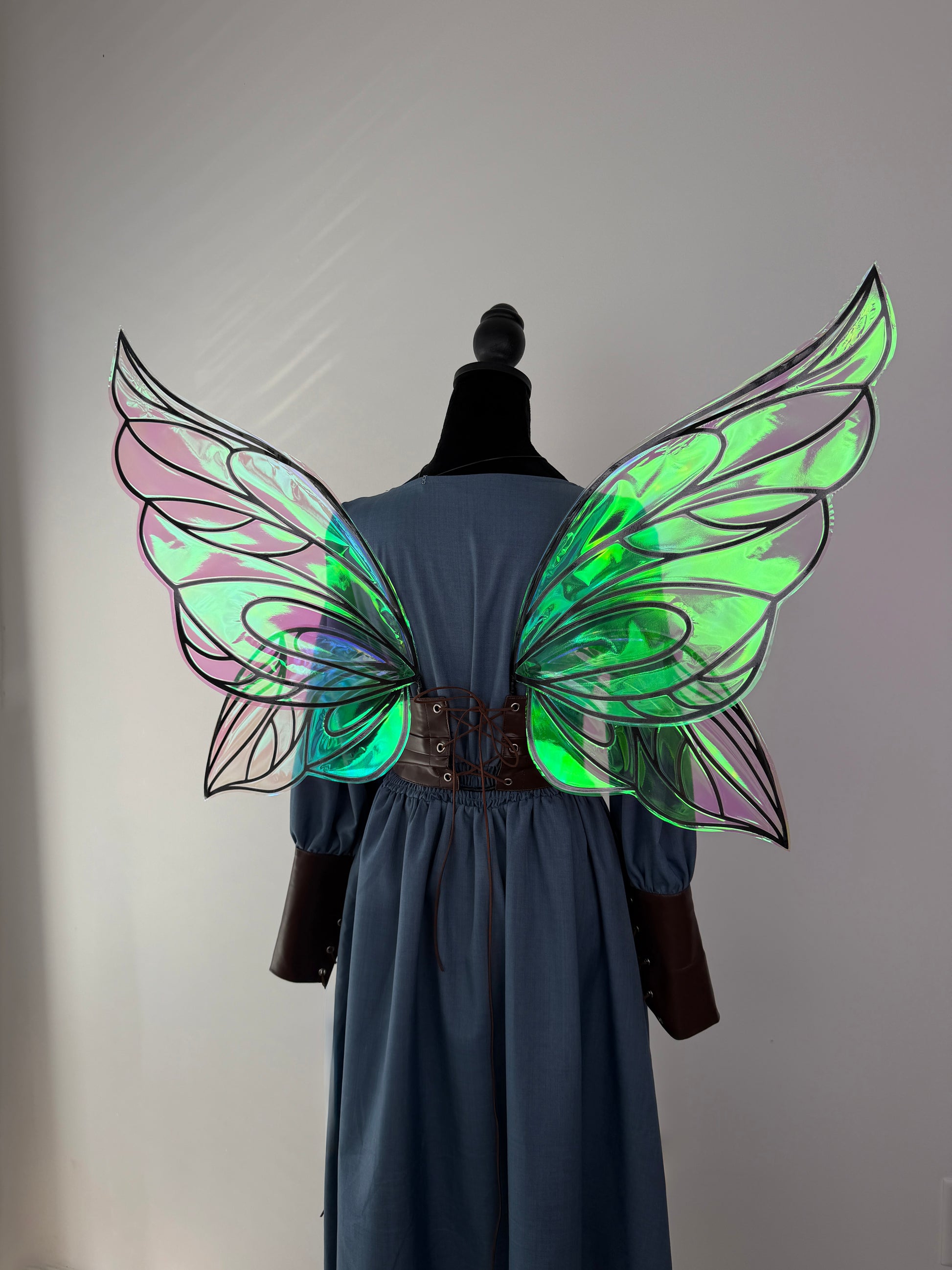 Lightweight adult fairy wings shown on a dress form to demonstrate scale and placement