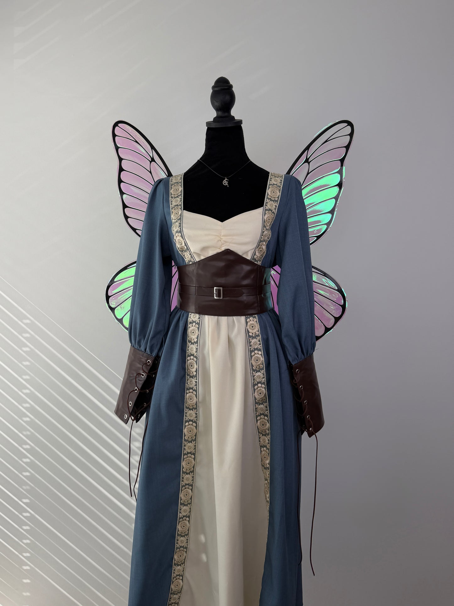 Premium handmade butterfly fairy wings with luminous iridescent finish and lightweight construction.