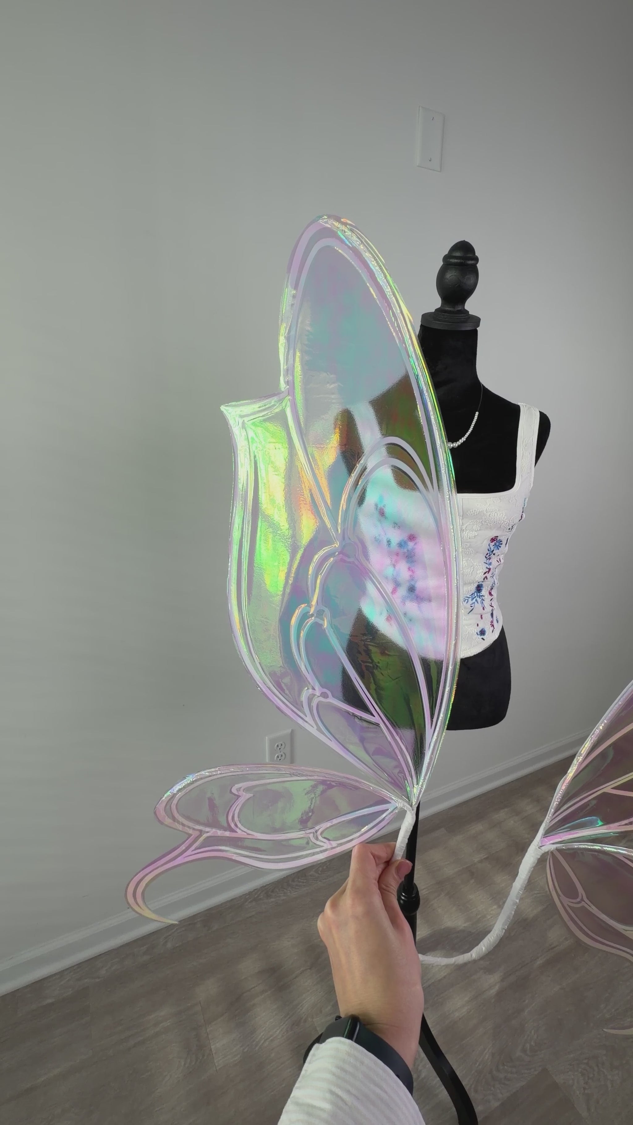 View of iridescent fairy wings costume on video
