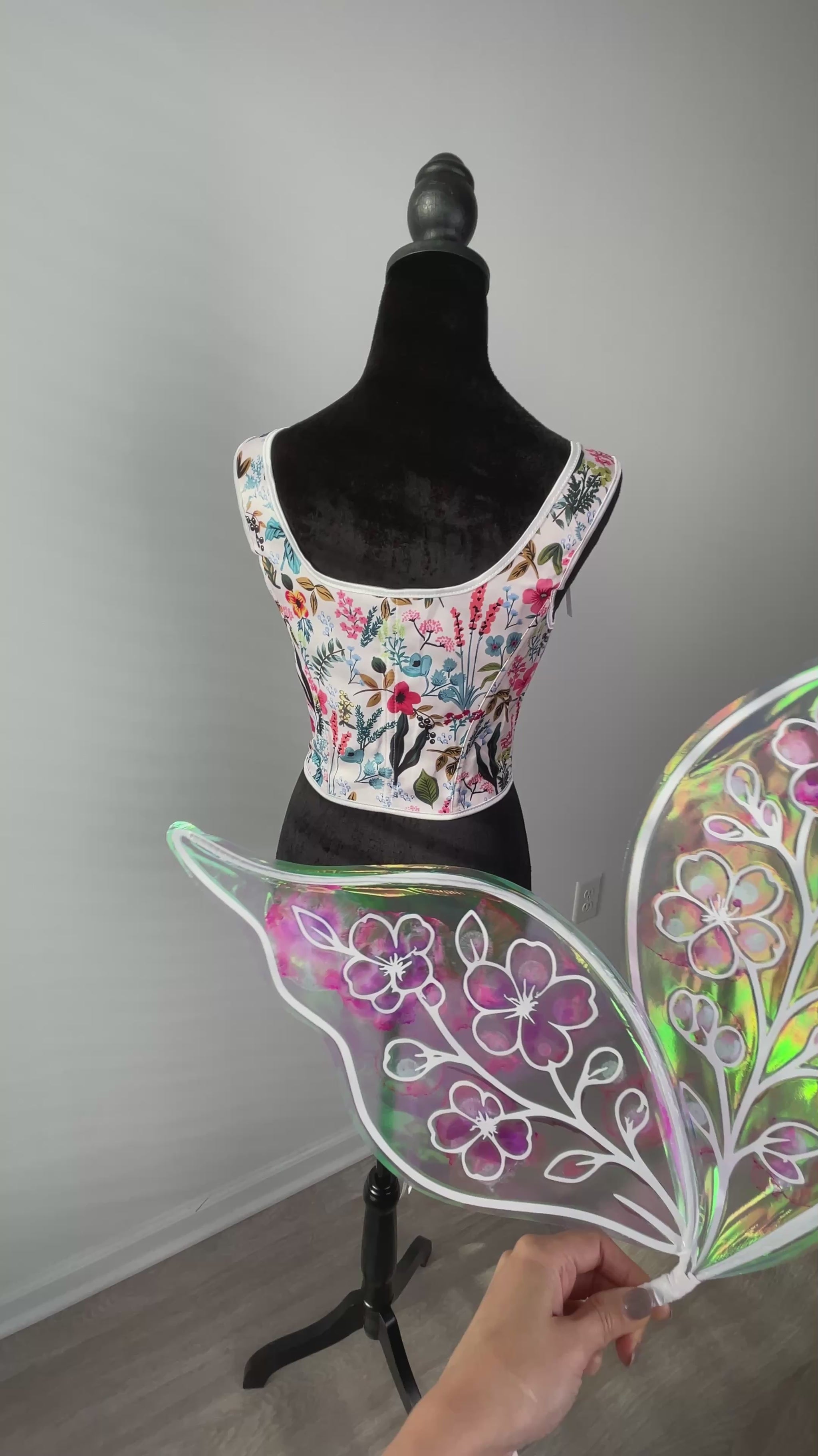 Back view of floral fantasy fairy wings on video